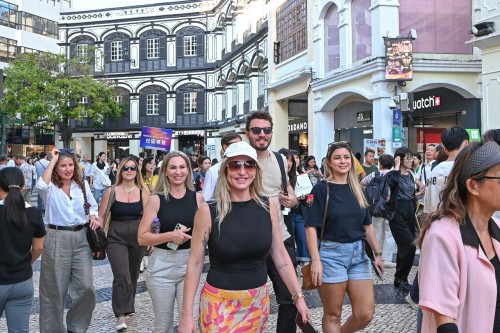Guided community tours promote Macao’s city image and business environment.